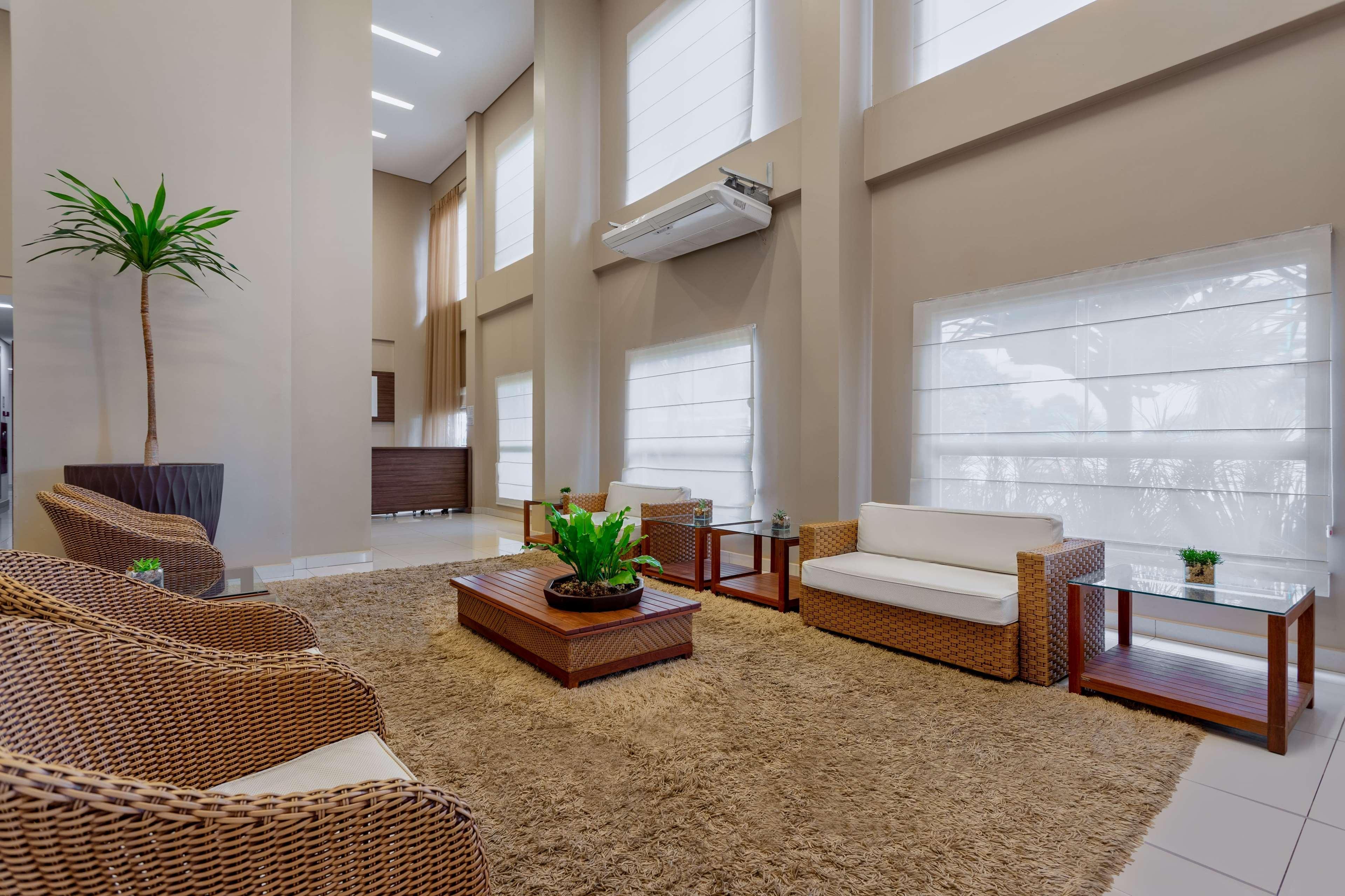 Wyndham Olimpia Royal Hotels Экстерьер фото A living room with a carpet